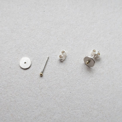 circle dot ear studs with 14k gold dot mezereem jewelry
